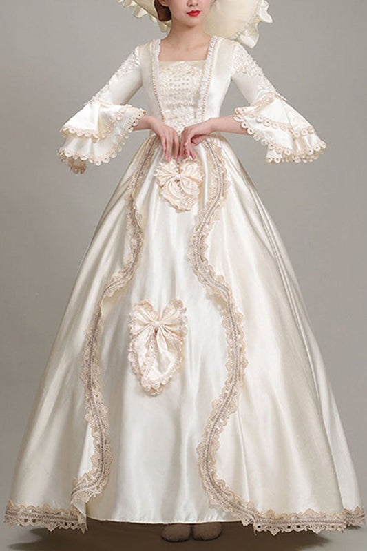Champagne Victorian Dress with Bow and Floral Embroidery
