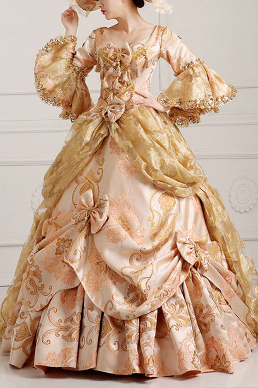 Beige Victorian Dress with Bow and Embroidered Floral Pattern