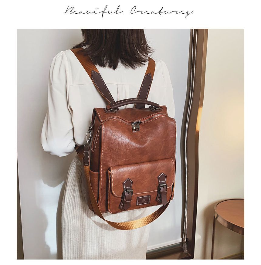 Faux Leather Buckled Backpack