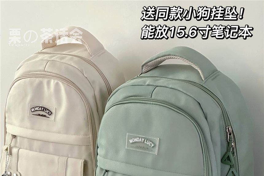 Lettering Label Buckled Flap Laptop Backpack