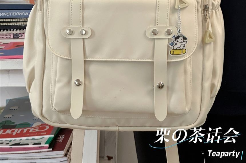 Lettering Label Buckled Flap Laptop Backpack