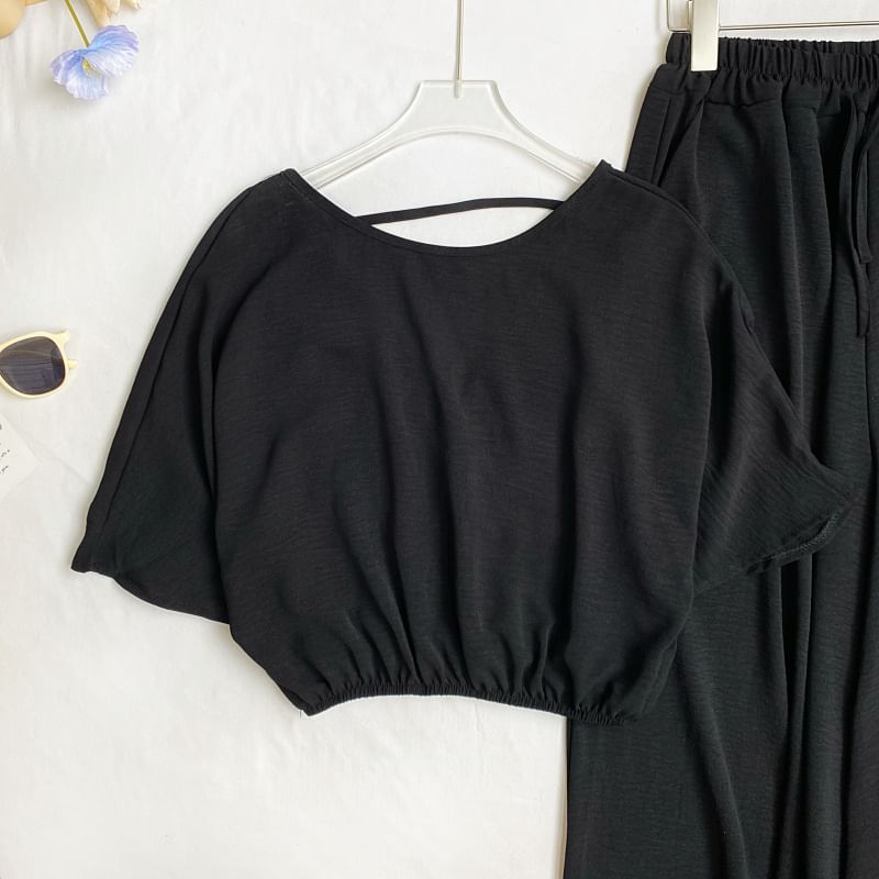 Set: Short-Sleeve Crew Neck Plain Open Back Crop Tee + Elastic Waist Wide Leg Pants