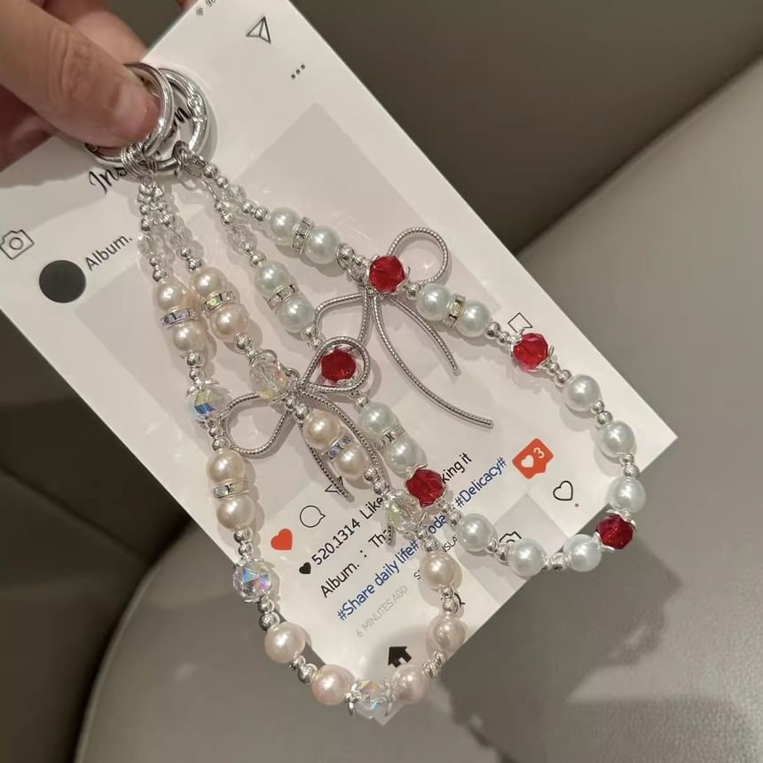 Bow Faux with Pearl Strap Pad Lanyard Phone