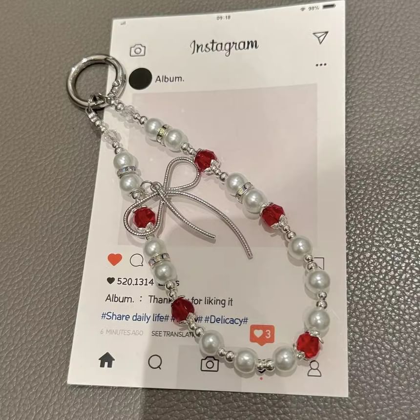 Bow Faux with Pearl Strap Pad Lanyard Phone