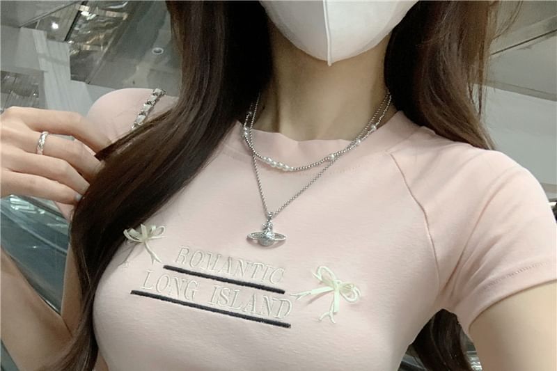 Embroidered Crop Tee Short-Sleeve Neck Accent Round Cutout Lettering Bow