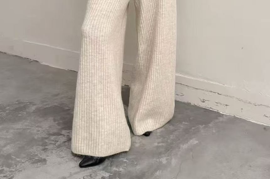 Wide-Collar Slit Knit Top Paired with Wide-Leg Trousers