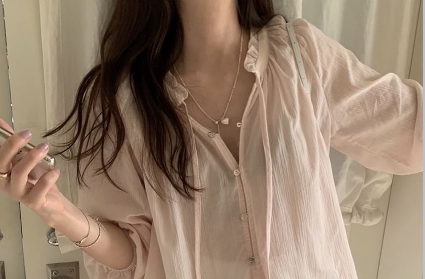 Ruffled Button-Up Blouse with Long Sleeves