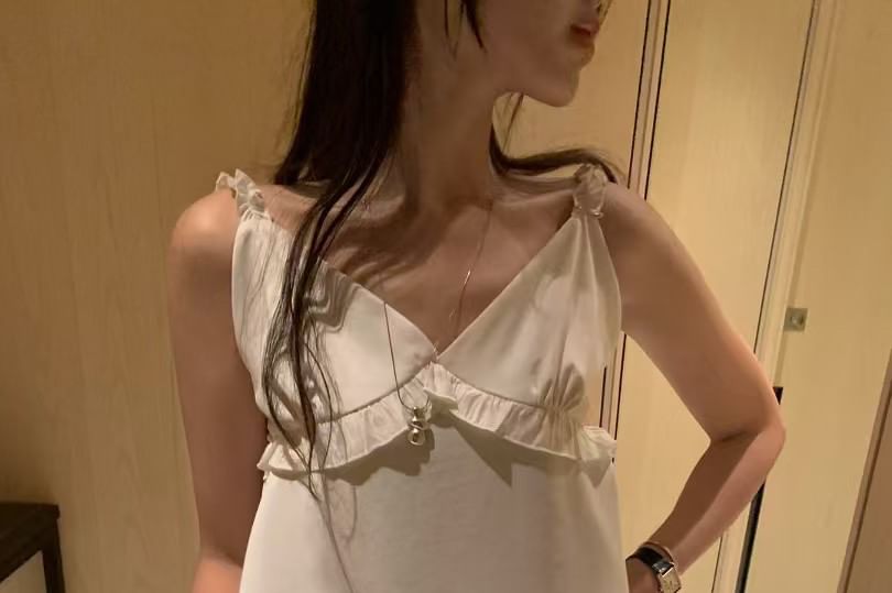 Sleeveless V-Neck Ruffle Trim Top