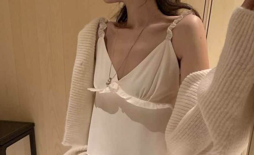 Sleeveless V-Neck Ruffle Trim Top
