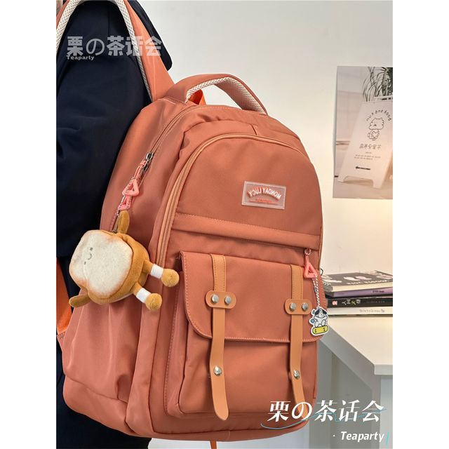 Lettering Label Buckled Flap Laptop Backpack