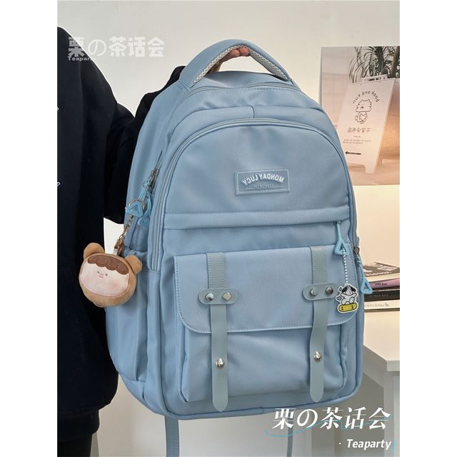 Lettering Label Buckled Flap Laptop Backpack