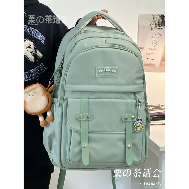 Lettering Label Buckled Flap Laptop Backpack