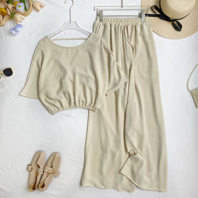 Set: Short-Sleeve Crew Neck Plain Open Back Crop Tee + Elastic Waist Wide Leg Pants