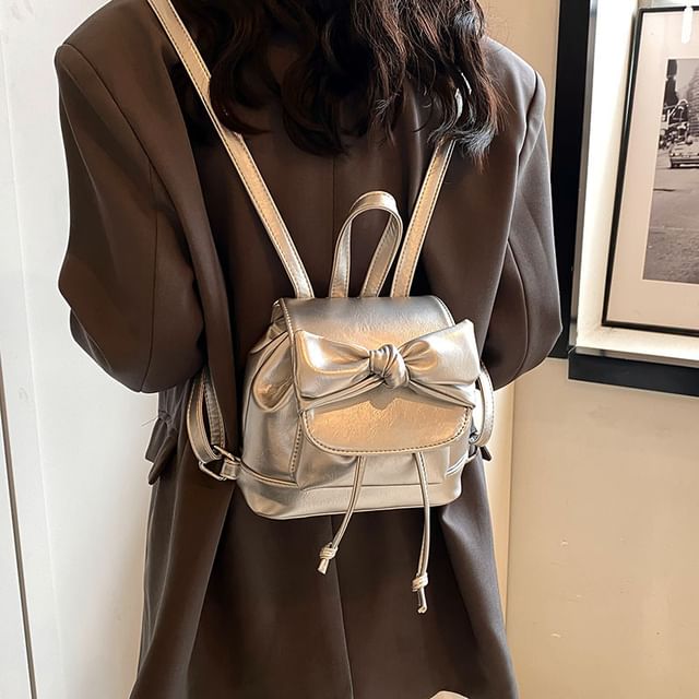 Faux Leather Knotted Drawstring Flap Backpack