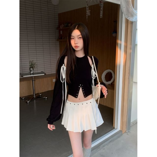 Coordinated Set: Long-Sleeve Shrug, Crop Top, and Pleated Skort