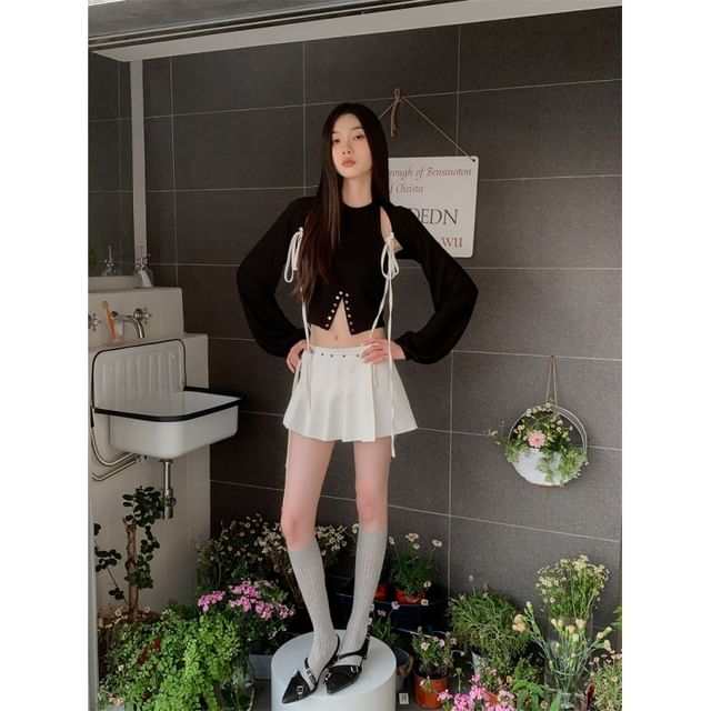 Coordinated Set: Long-Sleeve Shrug, Crop Top, and Pleated Skort
